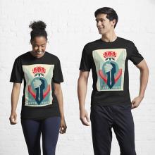 Two people side by side in dark blue t-shirts with Shepard Fairey's artwork on the front