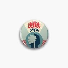 Round pin with Shepard Fairey's artwork